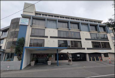 A building with a sign on the front

AI-generated content may be incorrect.