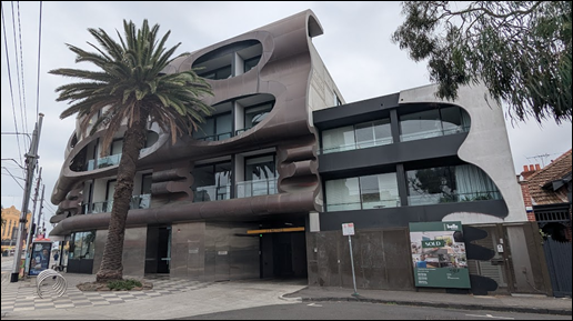 A building with a palm tree

AI-generated content may be incorrect.